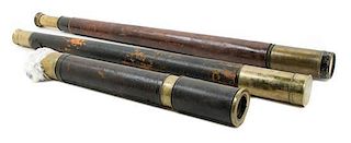 * A Group of Three Leather Cased Telescopes Length of longest 37 inches.
