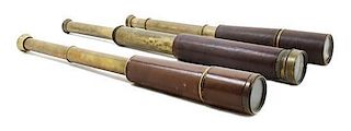 * A Group of Three Leather Body Hand Telescopes Length of longest 11 1/2 inches (when collapsed).