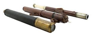 * A Group of Three Leather Body Single-Draw Hand Telescopes Length of longest 19 inches (closed).