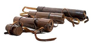 * A Group of Four Leather Body Hand Telescopes Length of first 19 inches (when collapsed).