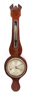 A Regency Mahogany Wheel Barometer Height 40 inches.