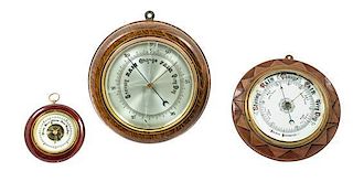 * A Group of Three Aneriod Barometers Diameter of largest 12 inches.