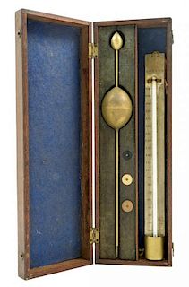 * An English Brass Hydrometer Length of hydrometer 13 inches.