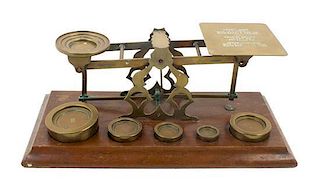 * An English Brass Postal Scale and Weights Width of base 12 1/2 inches.