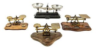 * A Group of Three Brass Postal Scales Width of widest 8 inches.