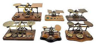 * A Group of Six Brass Postage Scales Width of largest 13 inches.