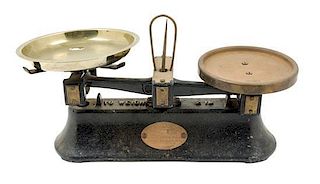 * An English Cast Metal Balance Scale Width 12 1/2 inches.
