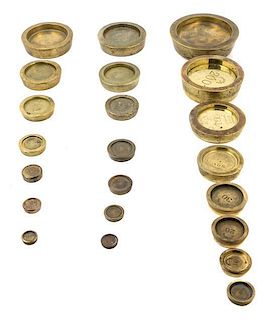 * Three Sets of Stackable Brass Weights Diameter of largest weight 5 inches.