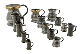 * A Collection of Pewter and Mixed Metal Measuring Beakers Height of tallest 6 inches.