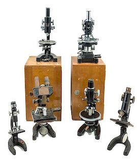 * A Group of Five Black Lacquered Microscopes Height of tallest 13 inches.