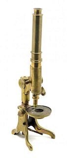 * An English Brass Microscope Height 10 inches.