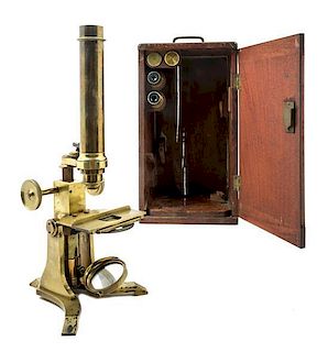 * An English Brass Microscope Height 13 inches.