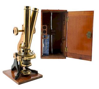 * An English Brass and Black Lacquered Binocular Microscope Height 13 1/4 inches.