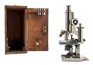 * An English Nickel-Plated Microscope Height of case 13 inches.