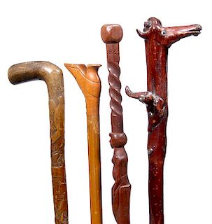 11. Four Folk Art Canes- Early 20th Century-A.L.- 34” $300-400