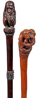 52. Pair of Monkey Canes- Ca. 1930- A pair of nice folk art carved monkey canes, 34 and 37” shafts, one has a metal ferrul