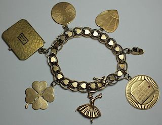 JEWELRY. 14kt Gold Charm Bracelet and 7 Charms.