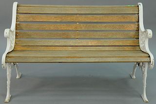 Park style bench having wood slats and iron ends. height 30 1/2 inches, width 49 1/2 inches Provenance: Property from the