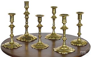 Six English Queen Anne brass candlesticks