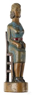 Carved and painted folk art seated woman