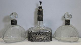 SILVER. Grouping of Silver Mounted Decanters.