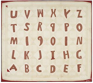 Pieced and appliqué alphabet quilt