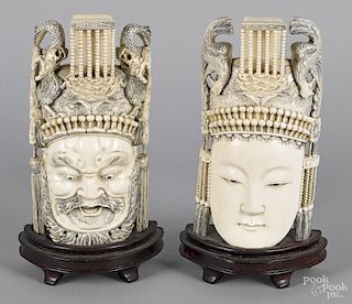 Pair of Chinese carved ivory masks