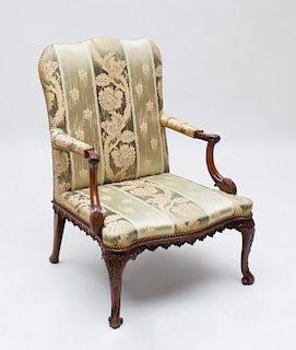 FINE GEORGE II CARVED MAHOGANY LIBRARY ARMCHAIR