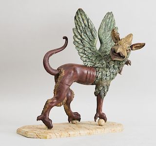 CONTINENTAL BAROQUE CARVED AND PAINTED WOOD FIGURE OF A GRIFFIN