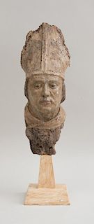 ITALIAN BAROQUE CARVED, PAINTED AND PARCEL-GILT HEAD OF A BISHOP