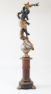 VENETIAN ROCOCO STYLE PAINTED AND PARCEL-GILT FEMALE MOOR FIGURE ON A GLOBE