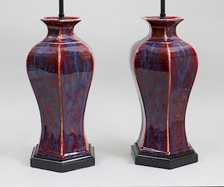 PAIR OF CHINESE OXBLOOD-GLAZED PORCELAIN HEXAGONAL VASES, NOW MOUNTED AS LAMPS
