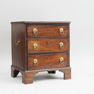 GEORGE III BRASS-MOUNTED MAHOGANY MINIATURE CHEST OF DRAWERS
