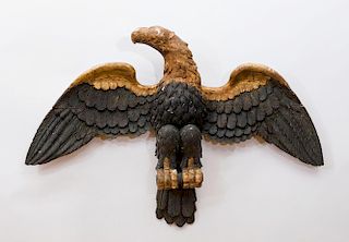 FRENCH CARVED BLACK-PAINTED AND PARCEL-GILT WALL EAGLE