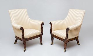 PAIR OF REGENCY CARVED ROSEWOOD LIBRARY ARMCHAIRS