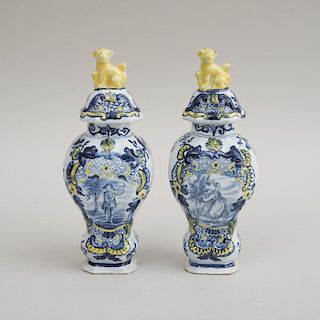 PAIR OF DUTCH POLYCHROME DELFT BALUSTER-FORM VASES AND COVERS