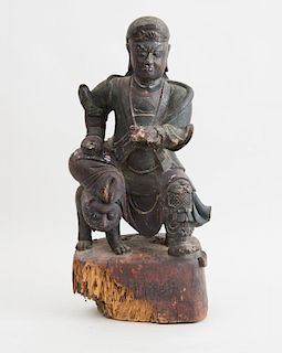 CHINESE CARVED WOOD FIGURE OF A LORD