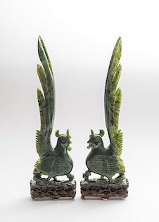 PAIR OF CHINESE CARVED SPINACH GREEN JADE FIGURES OF PHOENIX BIRDS