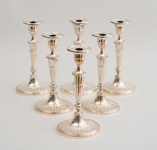 SET OF SIX ENGLISH WEIGHTED AND SILVER-PLATED CANDLESTICKS, IN THE ADAMS STYLE
