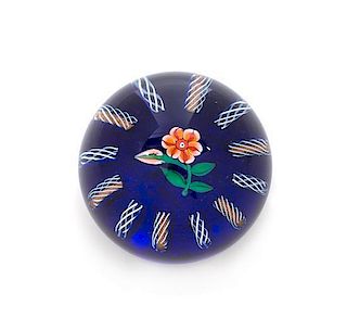 * Paul Ysart, (Spanish, 1904-1991), a translucent blue-ground flower paperweight