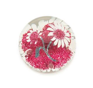 * Attributed to Edward Rithner, (American), a pink and white daisies paperweight