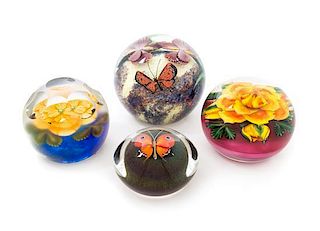 Orient & Flume and Lundberg Studios, four color ground paperweights
