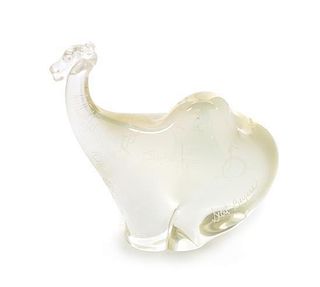 * Orient & Flume, Chino, California, a camel iridescent glass paperweight with etched signatures throughout, 1988