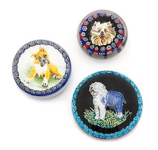 * Three Murano Garlanded Dog Paperweights Diameter of largest 3 3/4 inches