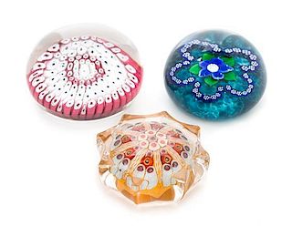 * A Group of Three Millefiori Paperweights Diameter of largest 3 inches