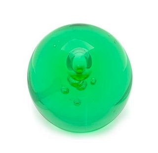 * A San Pacific Green Bottle Paperweight Diameter 2 1/2 inches