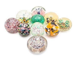 * A Group of Ten Large Glass Paperweights/Doorstops Diameter of largest 5 3/4 inches