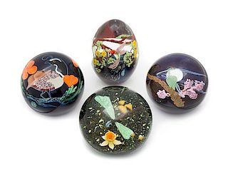* Four Glass Paperweights Diameter of largest 3 1/4 inches