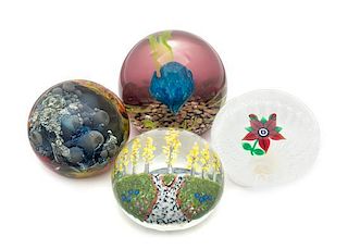 * Four Glass Paperweights Diameter of largest 3 inches
