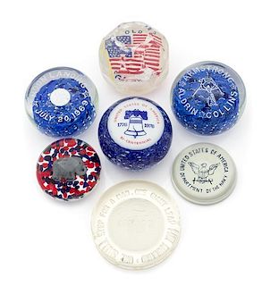 * A Group of Seven American Commemorative Glass Paperweights Diameter of largest 3 1/2 inches